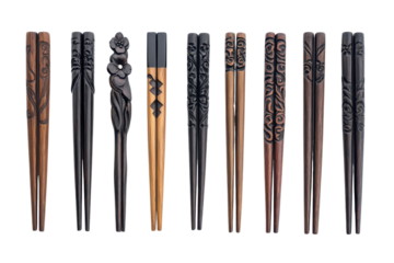 Collection of assorted wooden chopsticks arranged vertically isolated on transparent background. Set of chopsticks isolated on white background.