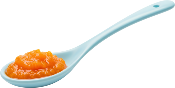 Light blue ceramic spoon holding bright orange pureed food isolate Baby Food Mashed Healthy Organic Ingredient