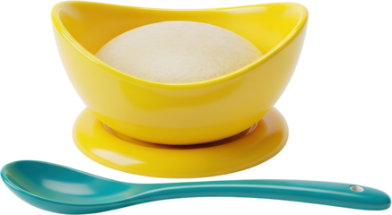 A yellow bowl filled with a creamy substance sits on a yellow saucer with a teal spoon beside it isolate