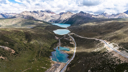 blue lakes and snow mountains in Western Sichuan