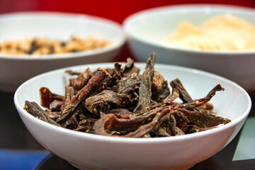 biltong south african air dried meet traditional made with beef, ostrich, kudu, very similar to american jerky