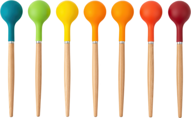 Seven colorful kitchen spoons with wooden handles arranged in a row isolate cooking utensil teal green