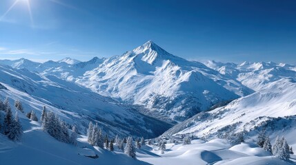 Snow Covered Mountain Peaks in Winter with Clear Blue Sky and Sunlight Landscape