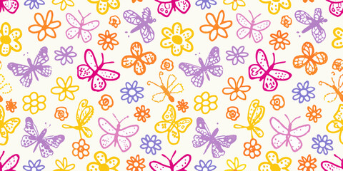 Seamless pattern of colorful hand drawn butterflies and flowers in a playful doodle style