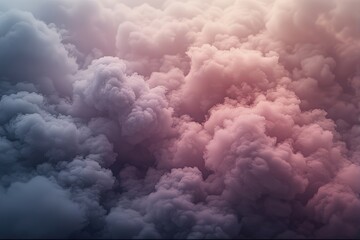 Dramatic clouds in soft pink, purple, and gray hues at sunset.