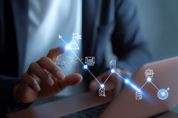  business goals concept. Businessman analyzes graph of trend market growth in 2025 and plans business growth and profit increases. calculates financial data for long-term investments.