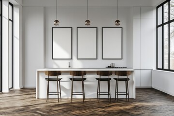 Modern kitchen design featuring a light-filled, minimalist aesthetic with wooden bar stools and blank framed artwork.