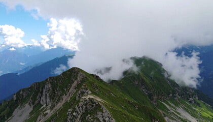 Mountain ridge shrouded in clouds
