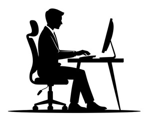 Silhouette of a Businessman Working on a Compute