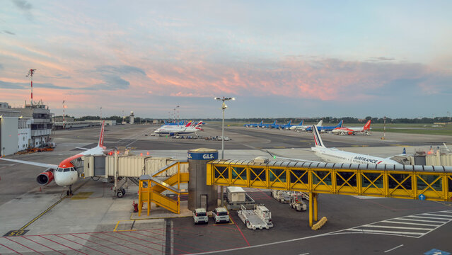 The LIN Milan Linate airport. View of the airport from the gates side. Airplanes at the gates or parked