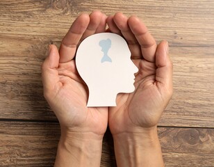 Hands protecting a profile head