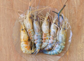 shrimps on the grill,Fresh whole prawns with their orange eggs inside,Fresh whole water prawns,Fresh whole river prawns