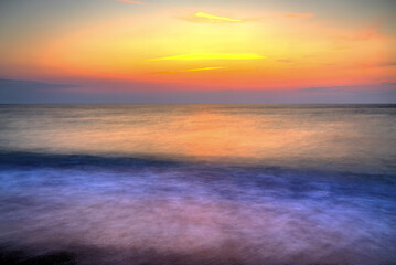 Beautiful summer sunrise over the beach
