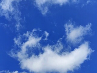 Natural sky background with soft clouds and clear atmosphere.