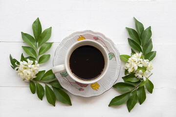 black coffee amaricano hot drinks with jasmine flowers arrangement flat lay style on background white 