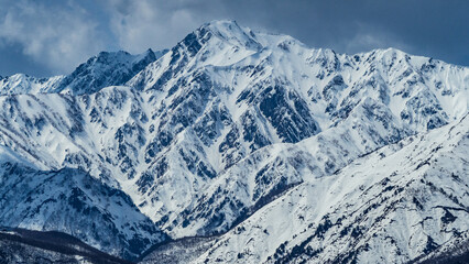 快晴の空と冠雪の北アルプス　長野県白馬村