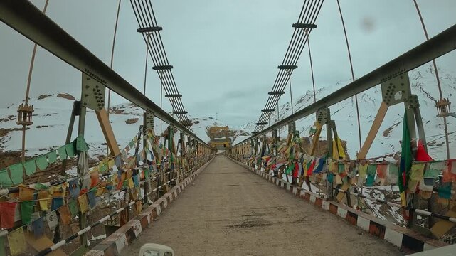 Adventure riding among scenic, Chicham Bridge, Himalaya mountains, landscape, Spiti Valley, Himachal Pradesh, India.