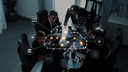 A diverse business team collaborates in a modern office setting, focusing on cloud technology strategy. Digital icons illustrate connectivity and innovation in communication. Raster - Powered by Adobe