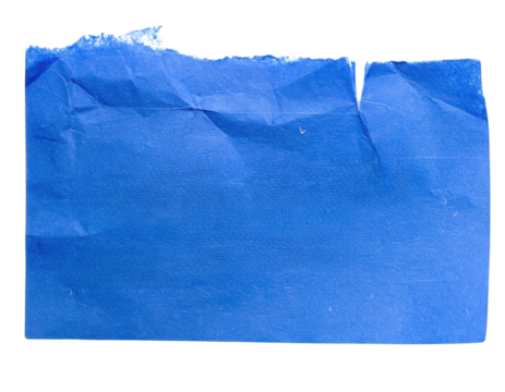 A crumpled piece of blue paper with jagged edges, showcasing texture and color variations.