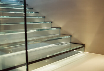 Modern Glass Staircase with Subtle Illumination