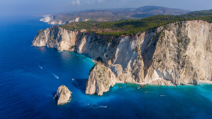 Myzithres rocks Zakynthos Greece aerial view with limestone cliffs turquoise bays sandy beaches and deep blue Ionian Sea under clear summer sky