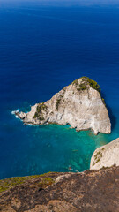 Plakaki beach Zakynthos Greece dramatic coastline aerial with limestone rocks turquoise bay and secluded hidden cove in bright summer light