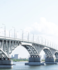 The bridge through the river Volga. Saratov.The bridge over the Volga River between the cities of Saratov and Engels. Panorama of the city and the Saratov bridge across the Volga river. Russia. 