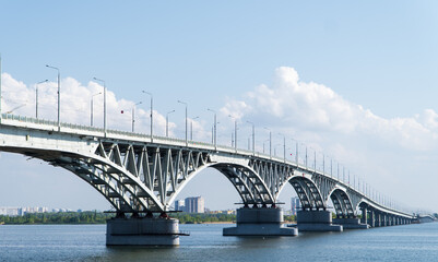 The bridge through the river Volga. Saratov.The bridge over the Volga River between the cities of Saratov and Engels. Panorama of the city and the Saratov bridge across the Volga river. Russia. 
