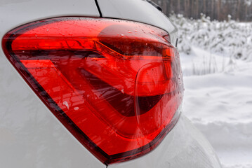 rear red car headlight close-up