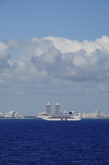 Italian family cruiseships cruise ship liners Armonia and Fortuna with Miami Beach, Florida skyline ready for Caribbean summer cruising