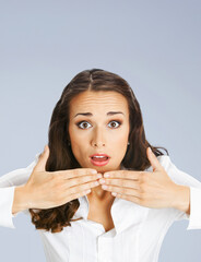 Wow! Expressive surprised, astonished shocked businesswoman wear white shirt. Amazed corporate business woman, isolated on grey gray background. Vertical banner image with free text space