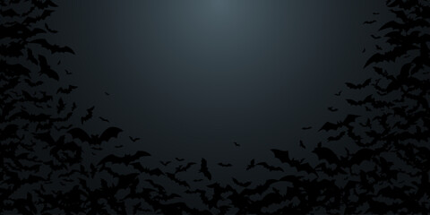 Deep dark Halloween background with flock of bats