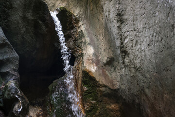 Waterfal inside a rock formation in the Carpathian Mountains, Romania