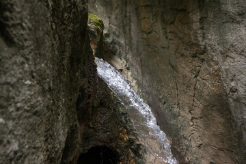 Waterfal inside a rock formation in the Carpathian Mountains, Romania