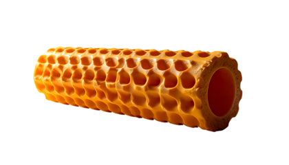Amber honeycomb-textured cylindrical object, possibly a roller, isolated on black