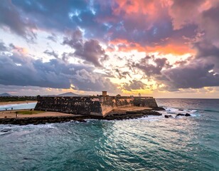 Dramatic sunset over a coastal fortress