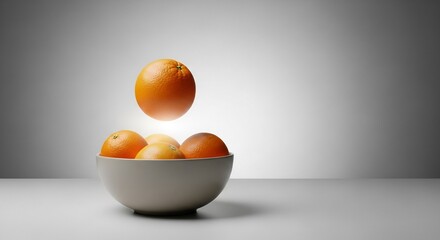 Levitating Orange Above Bowl of Citrus Fruits with Soft Gradient Background