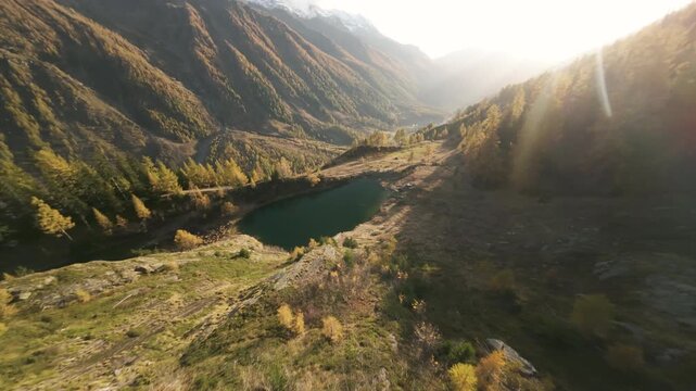 Flying over a little lake on a mountain, autumn, L&ouml;tschental, Switzerland