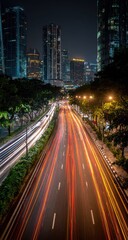 Fototapeta premium Night city street with blurred car lights