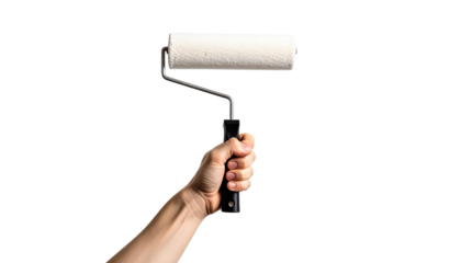 A hand holds a paint roller against a black background (1)