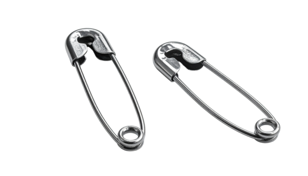 Two safety pins angled, metallic gray, simple, isolated