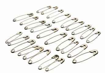 Fototapeta premium Free Transparent PNG Rustic Silver Safety Pins: A Collection of Metal Pins for Sewing and Crafts