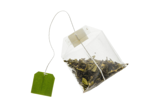 A single tea bag filled with loose green tea leaves, isolated on a transparent background. background removed