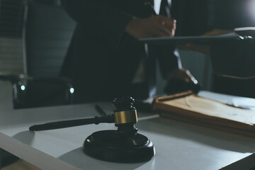 Lawyer explained to the client about the law that must be brought against the court case.