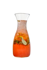 Strawberry mojito with lime, mint, ice, and bubbles in a glass pitcher — a refreshing summer drink with fruity-herbal flavor.