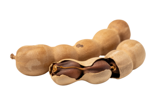 Close-up of two ripe tamarinds, one opened to reveal its dark brown seeds. background removed