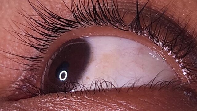 Macro video of female eye. Extremely close up view of motion woman eye