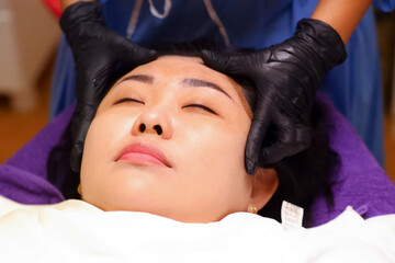 The customer lies on the bed.