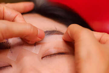 Eyebrow measurement and marking points.
