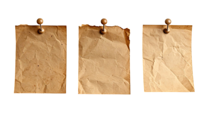 Three aged, crumpled, paper notes pinned to a dark background